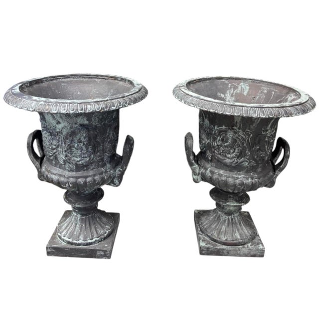 Elevate your entryway, patio, or interior styling with this striking pair of Neoclassical cast iron urn planters. Crafted...
