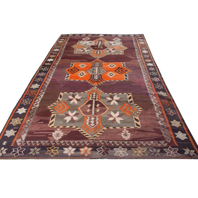 Vintage handwoven decorative kilim rug from Kars region of Turkey. Approximately 50-60 years old. In very good condition.