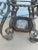 Maitland - Smith Pair of Hollywood Regency Scrolled Iron & Glass Side Tables With Stone Inset Shelves For Sale - Image 4 of 8