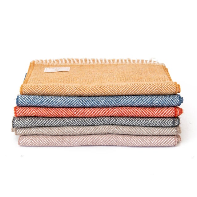 Made from one of the finest, lightest, and softest fibers, our everyday alpaca scarf is ready to style you and keep you...