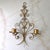 Large vintage Italian style gilt wall-hanging sconce with scrolling flourshes and two candle holders. Two sconces...