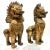 This unique pair of gilded bronze Foo Dogs are nicely executed and detailed with an aged gold finish with some verdigris...