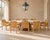 A beautifully crafted signed set of eight caned dining chairs designed by Billy Baldwin and hand-crafted by Bielecky...