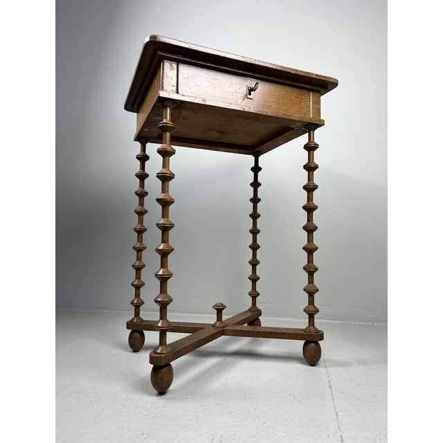Beautifully designed table with drawer on high legs. The drawer can be locked with the accompanying key. Combines well...
