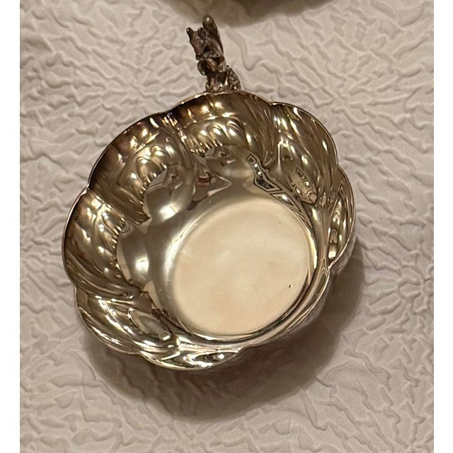 A wonderfully whimsical and increasingly difficult-to-find matched set of six antique silver-plated nut or bonbon bowls,...