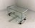 Side table, audio rack, television table on wheels from the Tris series by Gallotti&Radice, Italy (marked). Glass with...