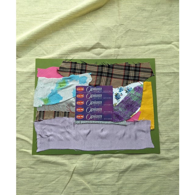 11" x 8.5" A colorful collage made of upcycled textiles, including packaging of incense sticks and mismatched patterns of...