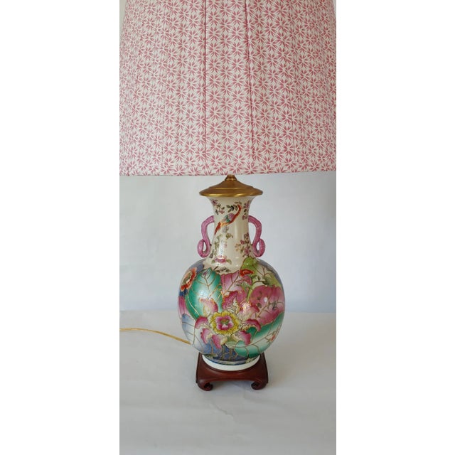 Vintage Hong Kong decorated export Tobacco Leaf gourd vase form lamps on antique Chinese bases. The leaves are royal blue,...