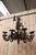 Wrought iron chandelier from the late 18th/early 19th century in good condition coat of arms on the chandelier's stem a...