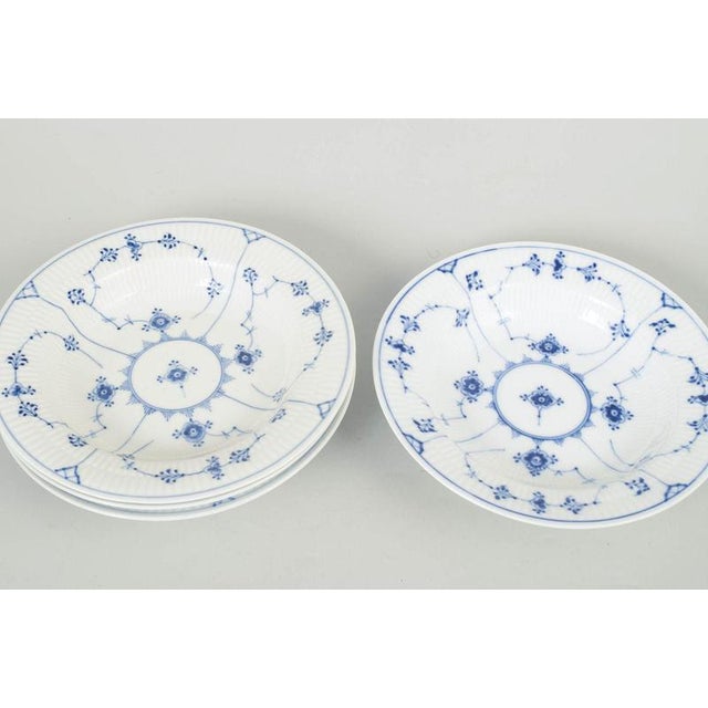 Royal Copenhagen Blue Fluted Plain, set of four pasta plates. Classic set of four pasta plates from Royal Copenhagen’s...