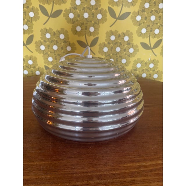 Invoking the busy, bustling energy of a beehive, the Splügen Braü—a creation by the famed Castiglioni brothers—feels both...