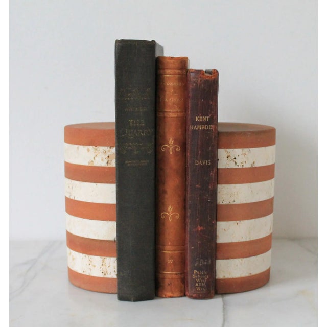 Pair of vintage travertine marble bookends by Fratelli Mannelli from the 1970s. Made in Italy. Makers mark on bottom....