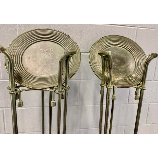 Beautiful tall iron fern stands. Circa 40s-50s with verdigris finish and removable catch trays on the top. Each measures...