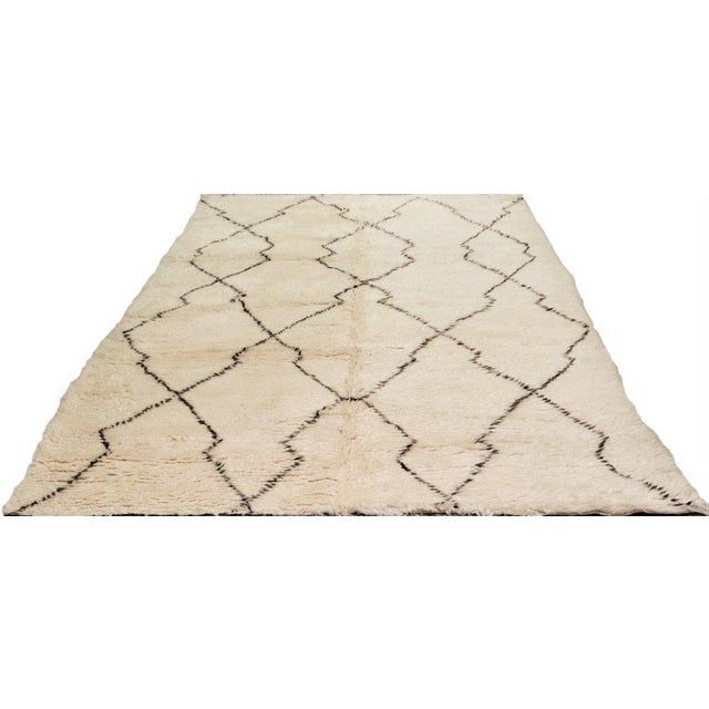 Moroccan Modern Hand-knotted with care using traditional rug-making techniques, this wool rug blends timeless...