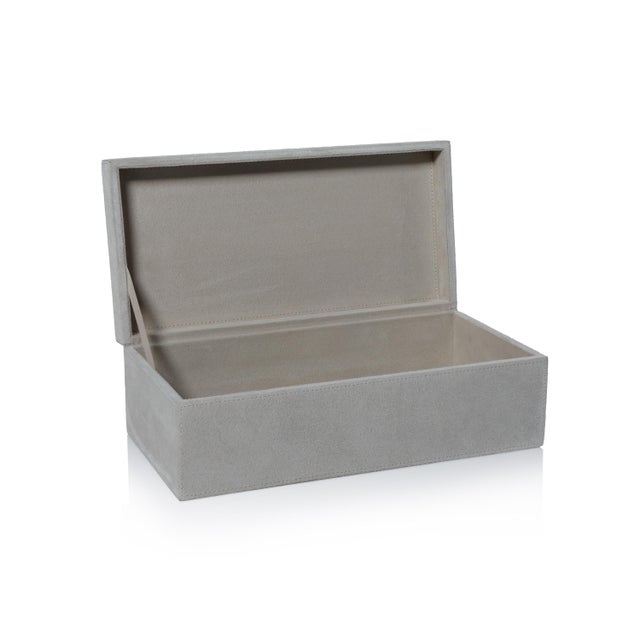 Elevate your organization with the refined texture and tailored appeal of the Arden Suede Leather Decorative Box. Wrapped...