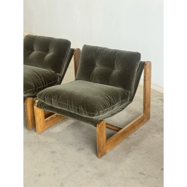 W31 D36 H30 SW26 SD21 SH20.5 These handcrafted lounge chairs anchored by a bold architectural alder base with rounded...