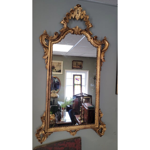Fabulous Italiam gilt wood florentine wall mirror. Measures 44 inches tall by 23 inches wide. Great for any room; bath,...