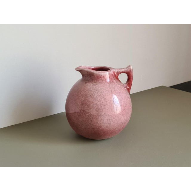 A stunning small vintage ceramic pitcher by Tim Orr, the renowned Anglo-French ceramist known for his organic forms and...
