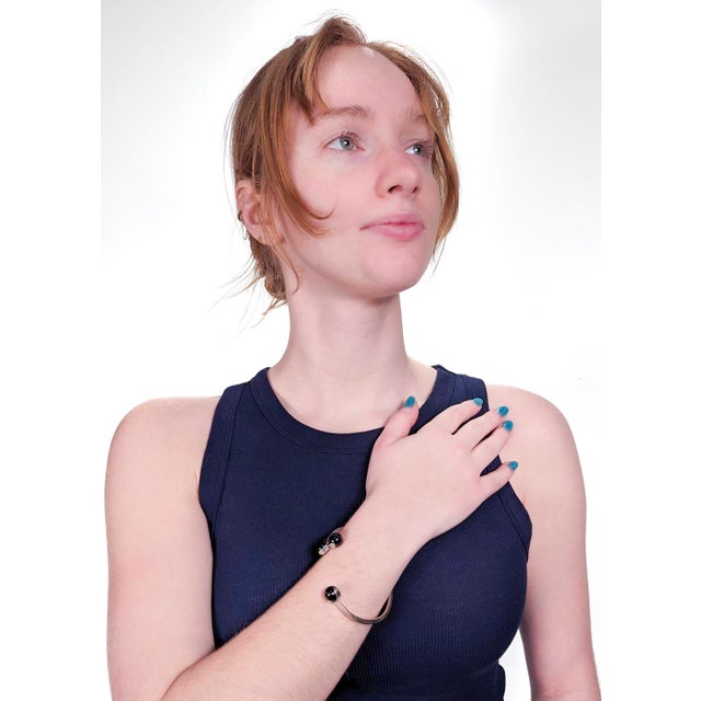 A fine modernist bracelet In sterling silver. Mounted with polished banded agate beads to the terminals. Struck with a...