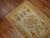 Very rare matching pair of antique khotans with one measuring 2'8" x 3'8" and the other measuring 2'8" x 3'9".