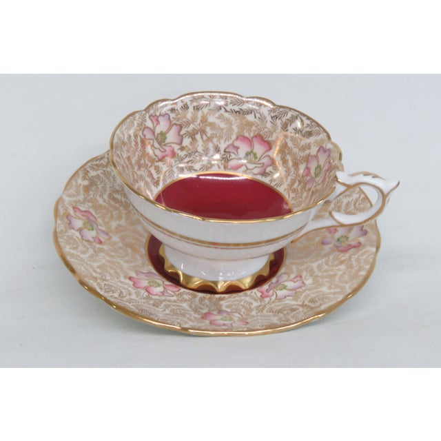 This lovely tea cup is made of bone china. This set is stamped as being made by Royal Stafford in England, with their...