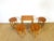 An elegant set of vintage nesting coffee tables from the 1960s, featuring a design that is both functional and refined....
