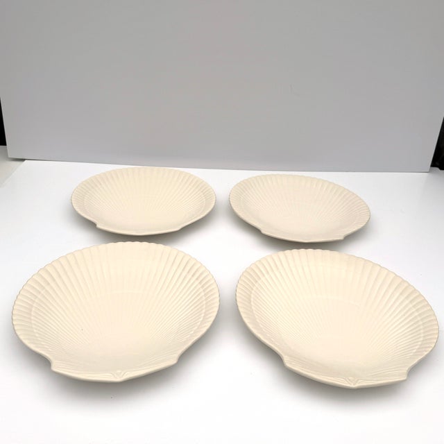 A lovely set of Wedgwood plates shaped as scallop shells. These are in pristine vintage condition and will make a perfect...