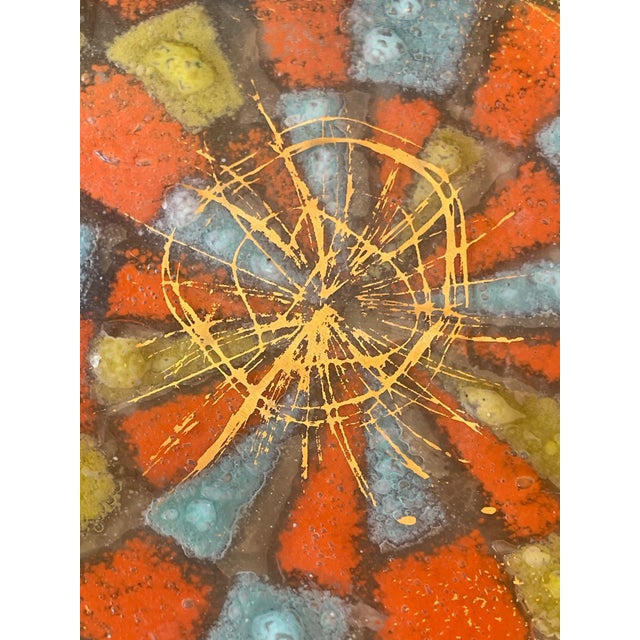 Geometric and Colorful bowl with fused glass by Higgins Art Glass. Oblong shape.