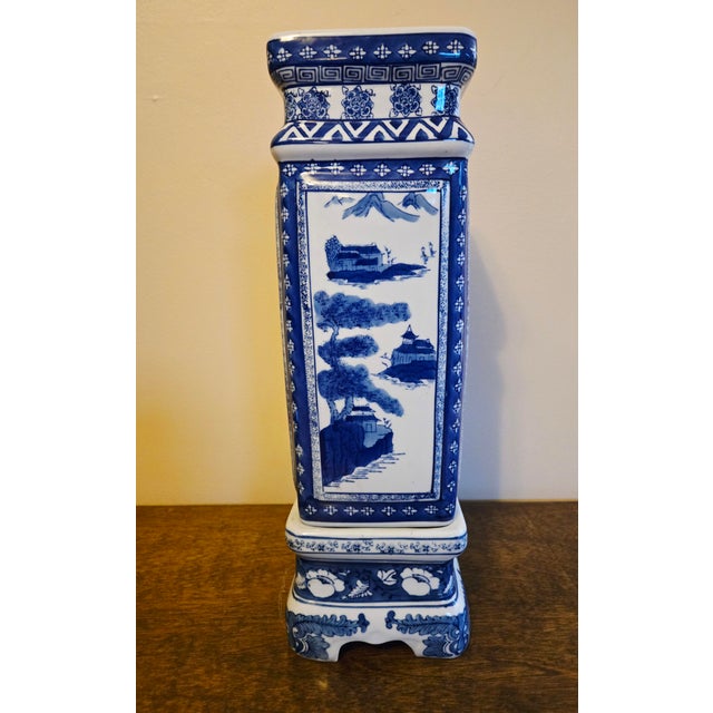 This is a beautiful large rectangular-shaped Chinese vase featuring traditional landscape scenes of trees, mountains and...