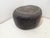 Moroccan Berber Arab footstool in decorated and stitched cowhide. Fair condition. One unstitched seam is visible in the...