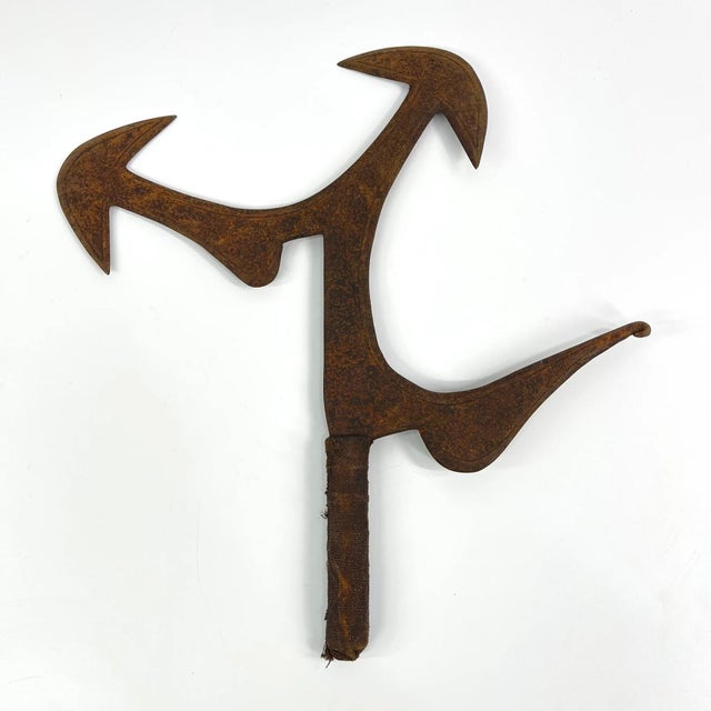 Mambele, Hunga Munga, throwing knife, African iron currency weapon, and Central African prestige blade. The form is...