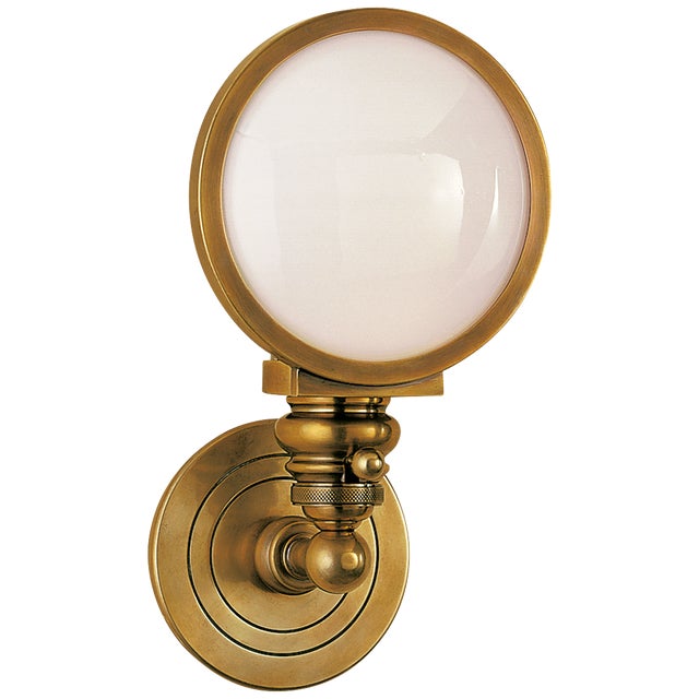 Boston Head Light Sconce in Hand-Rubbed Antique Brass with White Glass Designer: Chapman & Myers Height: 11.5" Extension:...