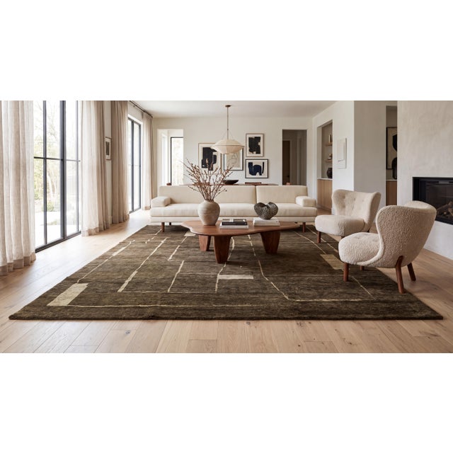 Elevate your space with this exquisite contemporary hand-knotted Moroccan Style wool rug, featuring a sophisticated deep...
