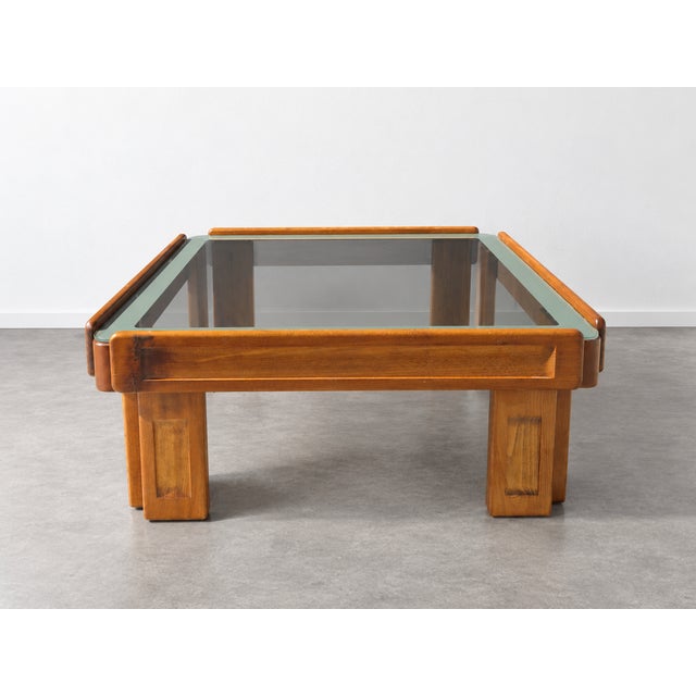 An elegant square coffee table, a piece of Italian modernism dating back to the 1960s. The piece features the signature...