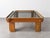 An elegant square coffee table, a piece of Italian modernism dating back to the 1960s. The piece features the signature...