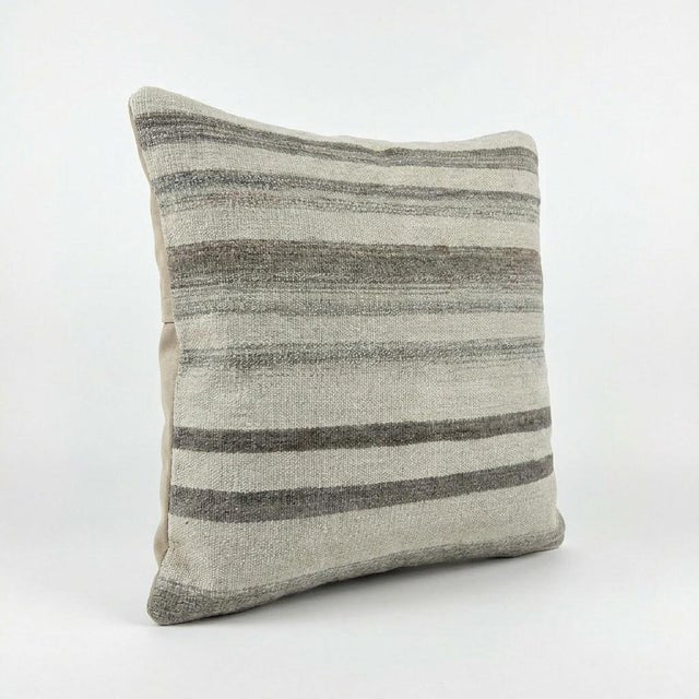 This beautiful 20'' X 20'' pillow cover was made from an authentic Turkish Kilim. Bright colors of wool adorn the front of...