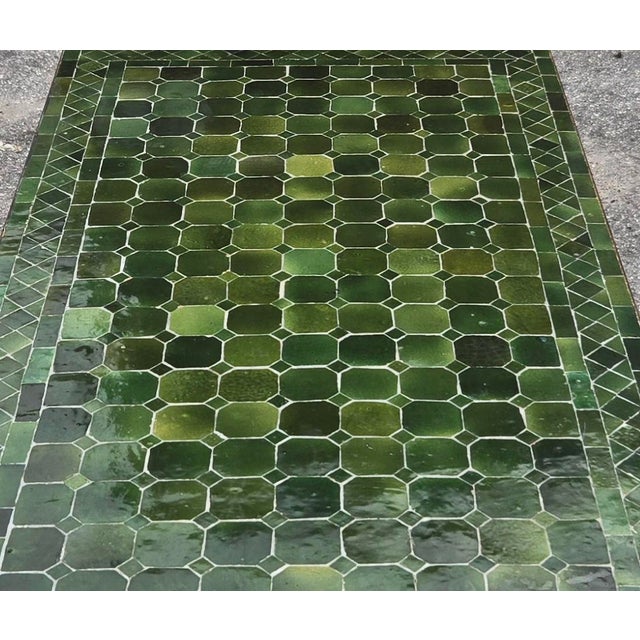 Bring authentic Moroccan craftsmanship to your home or patio with this striking Tamegroute-inspired mosaic table. The...