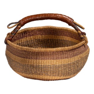 Mid 20th Century Ghana Tan Wicker Basket For Sale