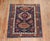 An early 20th century traditional navy blue and brown square size Persian Heriz carpet. Measures: 3'4" x 4' Heriz carpets...