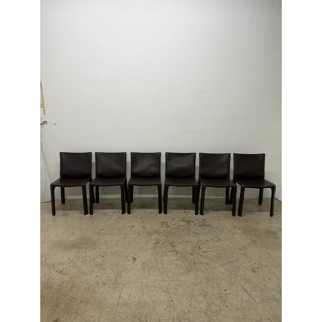 Set of six Cab 413 brown leather dining or side chairs designed by Mario Bellini for Cassina. Italy, 1990s. “This was a...