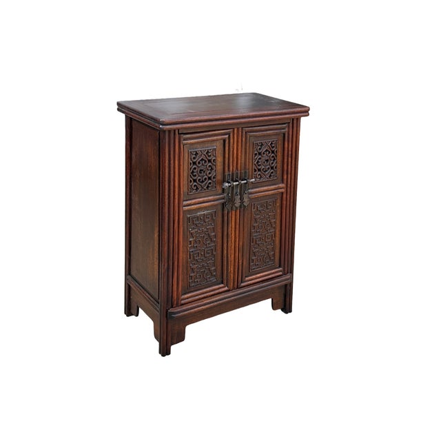 Add a touch of timeless Eastern elegance to your home with this Oriental Natural Brown Relief Motif Side Cabinet. Expertly...