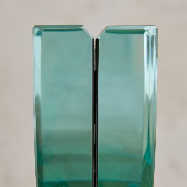 Attributed to Fontana Arte, this sculptural 1960s photo frame is composed of thick, curved glass panels with beveled...