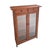 Bring warm British Colonial character and natural texture to your home with this lovely vintage glass door cabinet...