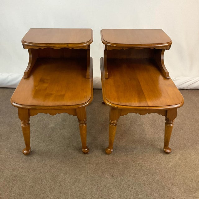 Classic 1970s Maple Step Down Side Tables. This pair is in the French Provincial style with traditional scalloped aprons...