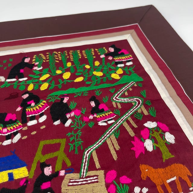 Laos Hmong inspired embroidered textile pillow cover with a figural village gardening scene. Hand embroidered. Originally...