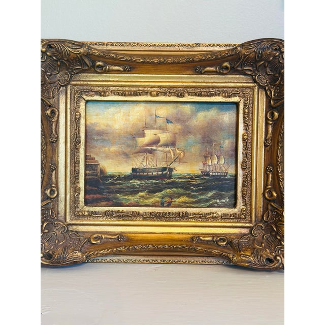 Charming vintage maritime oil painting depicting a pair of tall sailing ships navigating lively coastal waters beneath a...