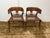 Design Plus Gallery presents a Pair of Klismos Chairs. These lizard-wrapped klismos chairs are luxurious, modern-...