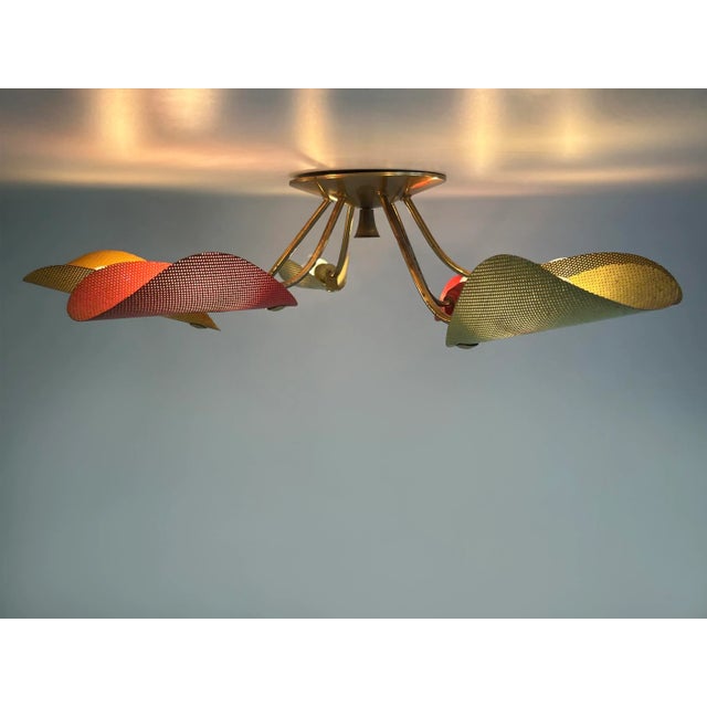 Extremely rare, lovely and highly decorative mid-century modern 6-armed sputnik ceiling lamp. Designed and manufactured in...