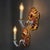 An elegant pair of single-light wall sconces in decorated porcelain, crafted by the prestigious p. Limoges france factory,...