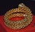 Authentic vintage FOPE solid 18K yellow and white gold double-wrap bracelet featuring bold, high-domed two-tone terminals....